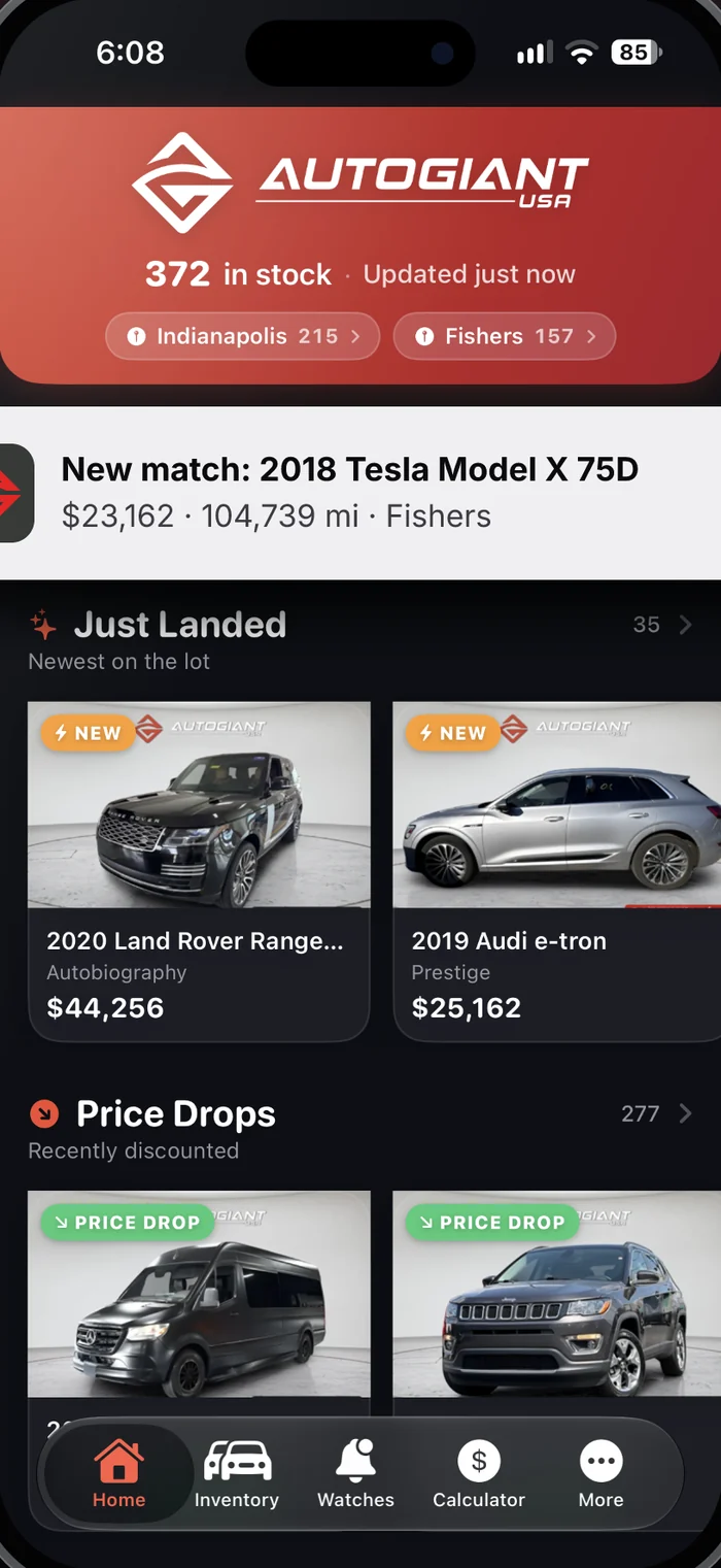 Auto Giant USA app home screen with 372 cars in stock and a new match alert